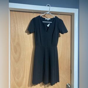 Lola and Grace size small, black, scalloped dress. Never worn! Tags still on